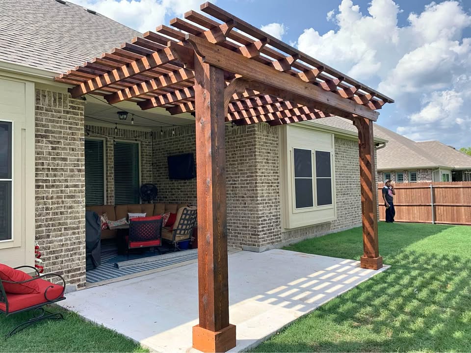 Attached cedar pergola with colorful seating area